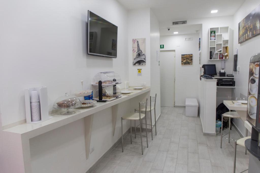 Kuchyňa alebo kuchynka v ubytovaní Metronia Guest House