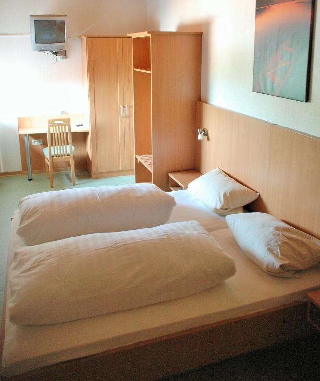 Postel nebo postele na pokoji v ubytování Hotel Meyerhoff