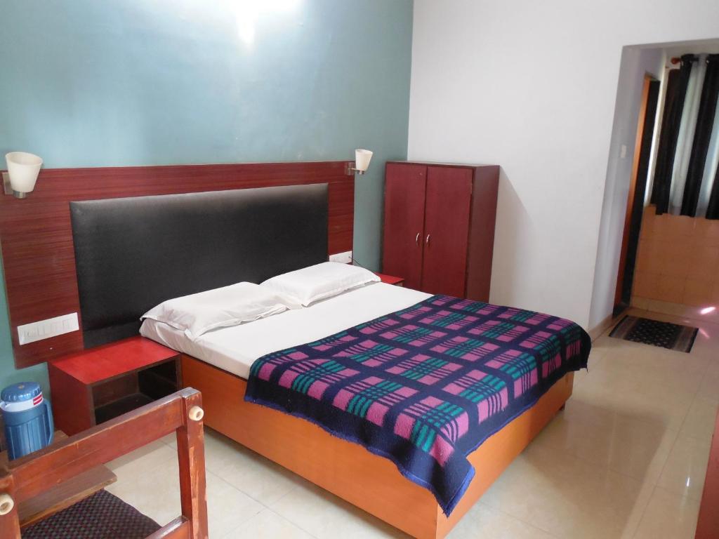 Postel nebo postele na pokoji v ubytování Hotel Silver Springs