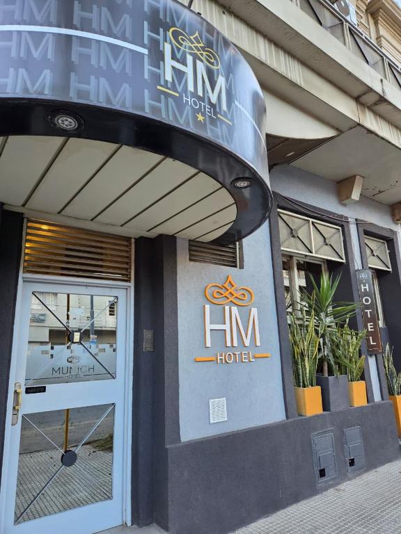 a building with a hin hotel sign on it at HOTEL HM in Córdoba