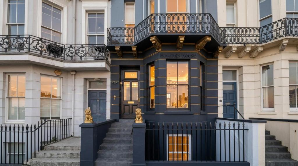 a building with stairs in front of it at Hastings House 9-Bedroom Holiday House in Hastings