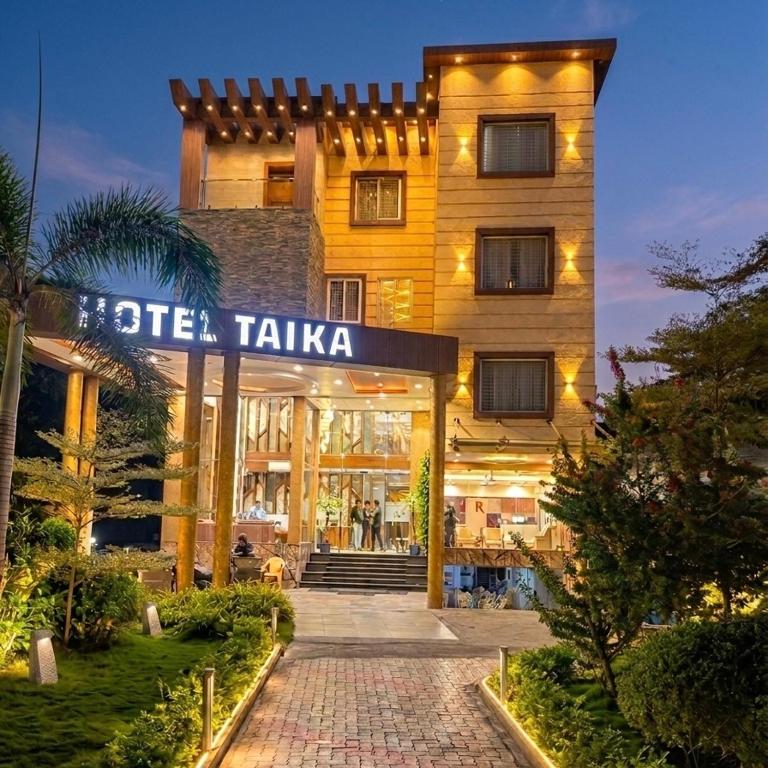 a hotel with a sign that reads hotel tkaka at Taika Hotels, 1km Away from Main Temple in Rāmeswaram
