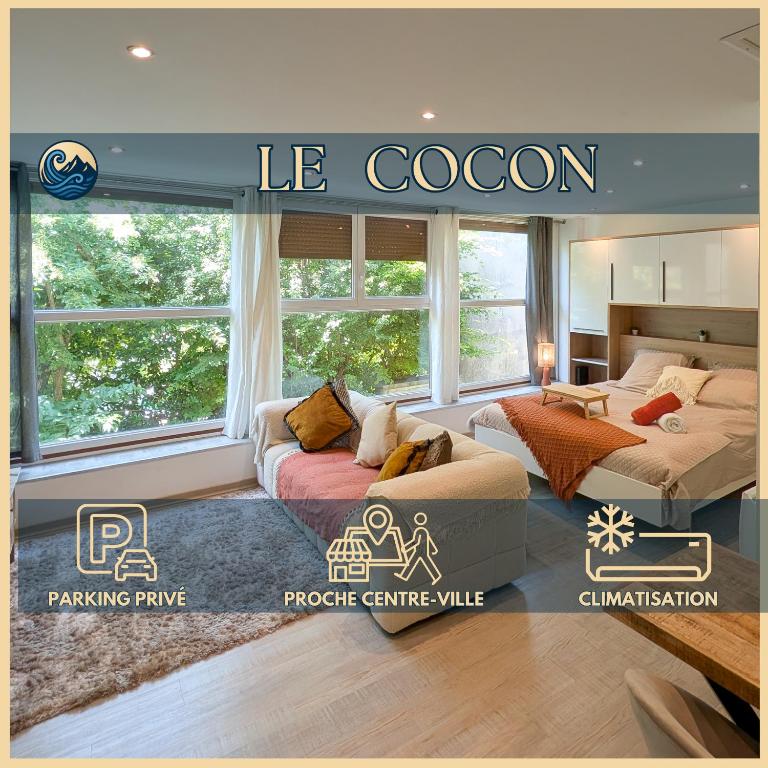 a living room with two beds and a couch at Cocoon studio in Gap