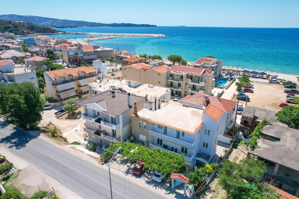 an aerial view of a city and the ocean at Solere Apartments in Limenaria