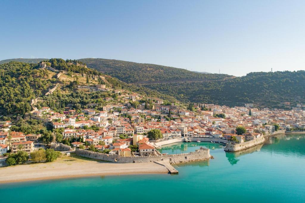 an aerial view of a town on the water at Giorgos House in Nafpaktos