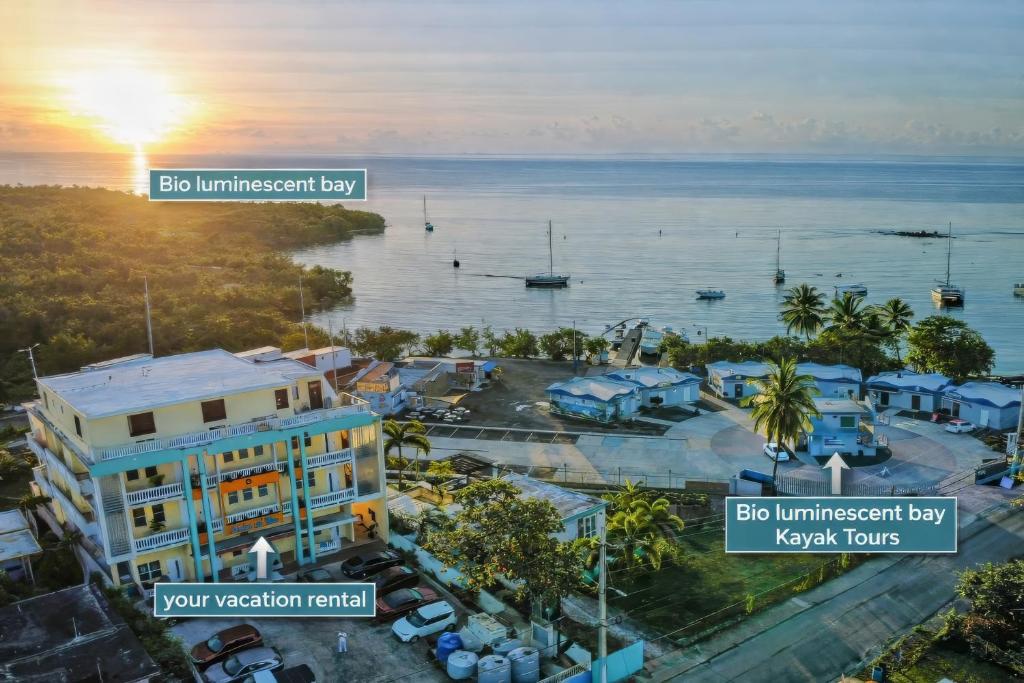 an aerial view of a building and the ocean at Sueños del Mar in Fajardo