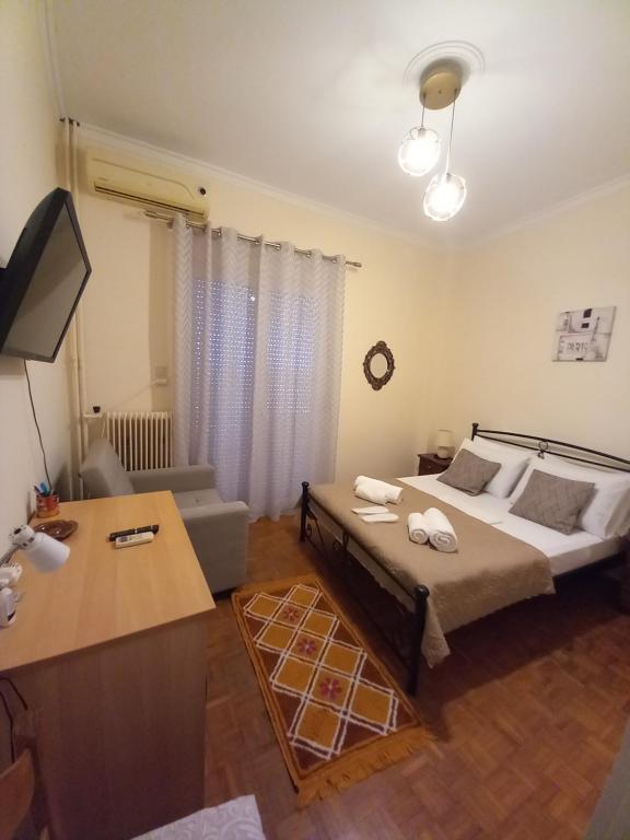 Llit o llits en una habitació de Ηλιαχτίδα Iliachtida apartment