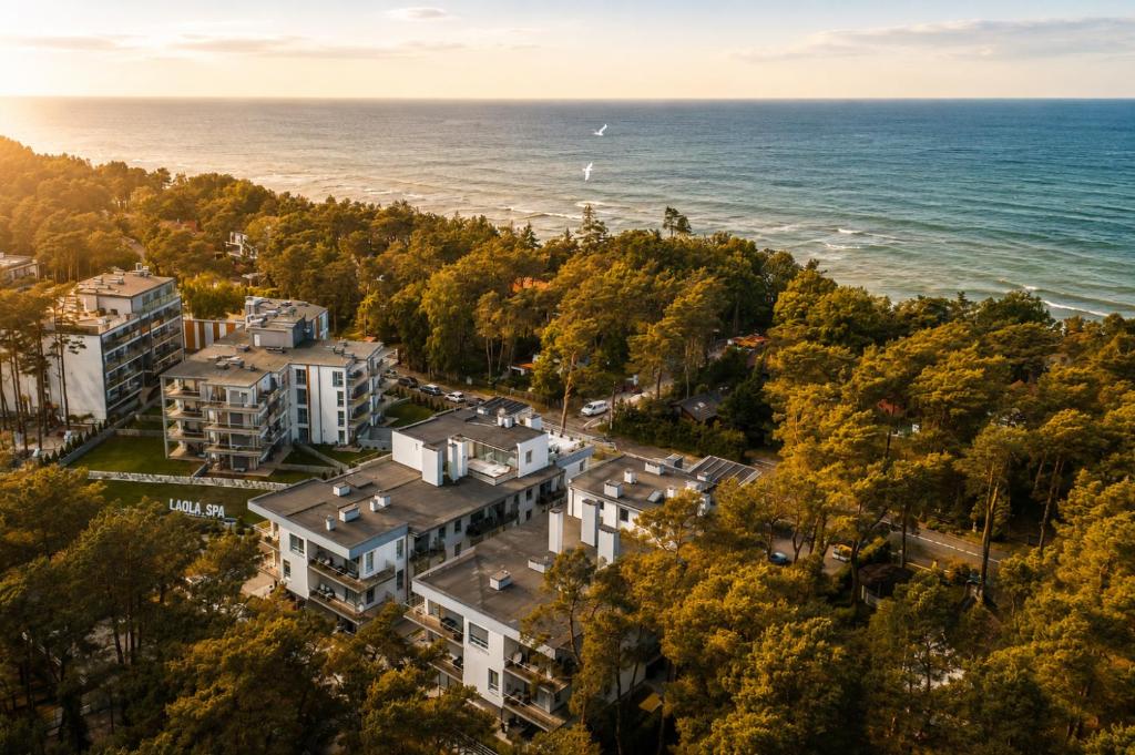 an aerial view of a city and the ocean at Apartament typu studio Doris 3 - 50m od plaży in Pobierowo