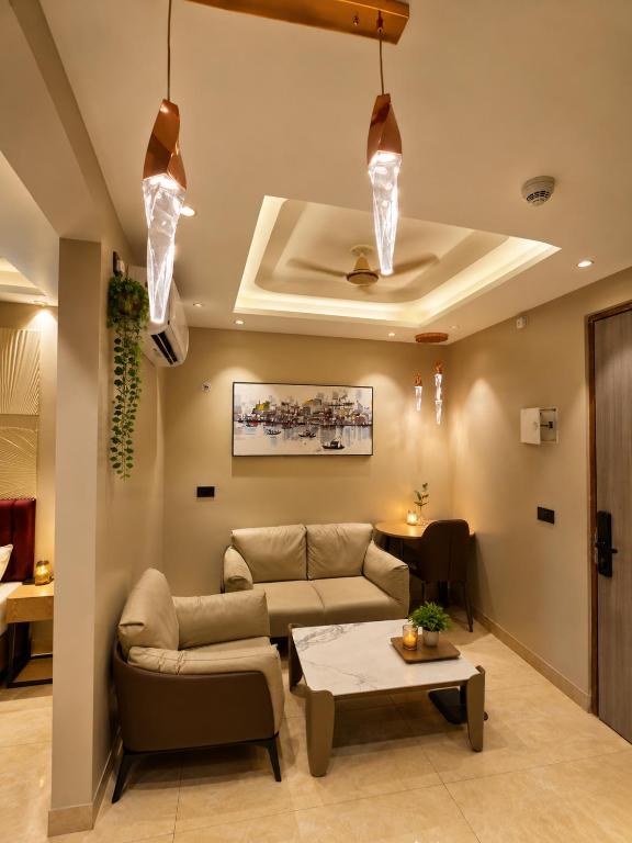 a living room with a couch and a table at SriVa Nest in Ghaziabad