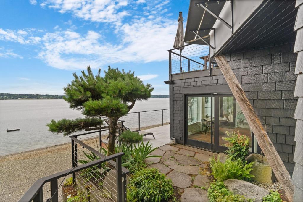a house with a view of the water at The Waterwheel in Bremerton