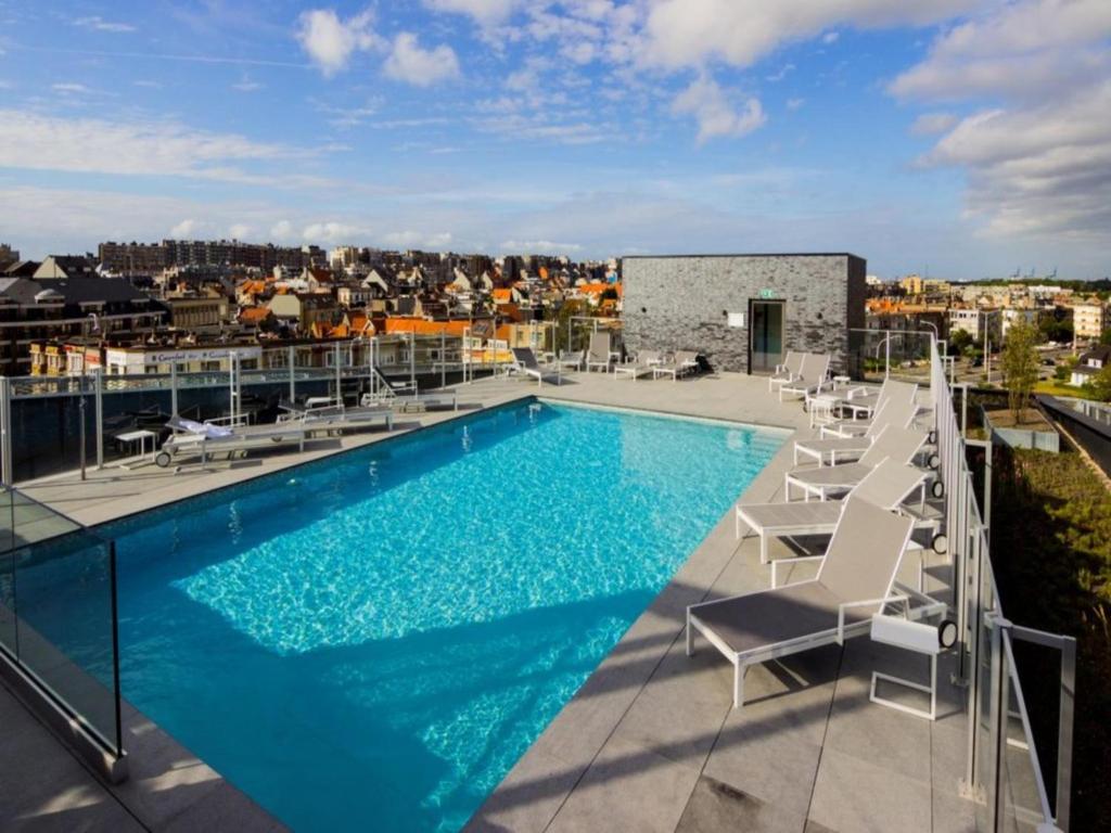 a swimming pool on the roof of a building at B City Complex - 0302 in Blankenberge
