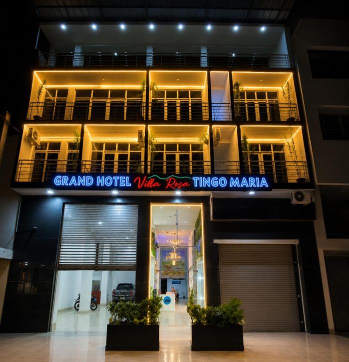 a building with a sign that reads grand hotel virgo mama at GRAND HOTEL ViLLA ROSA in Tingo María