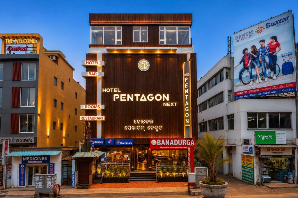 a building in a city with shops and buildings at Pentagon Next Bhubaneswar in Bhubaneshwar