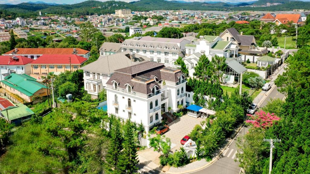 an aerial view of a large white house at Maro Boutique Villa in Da Lat