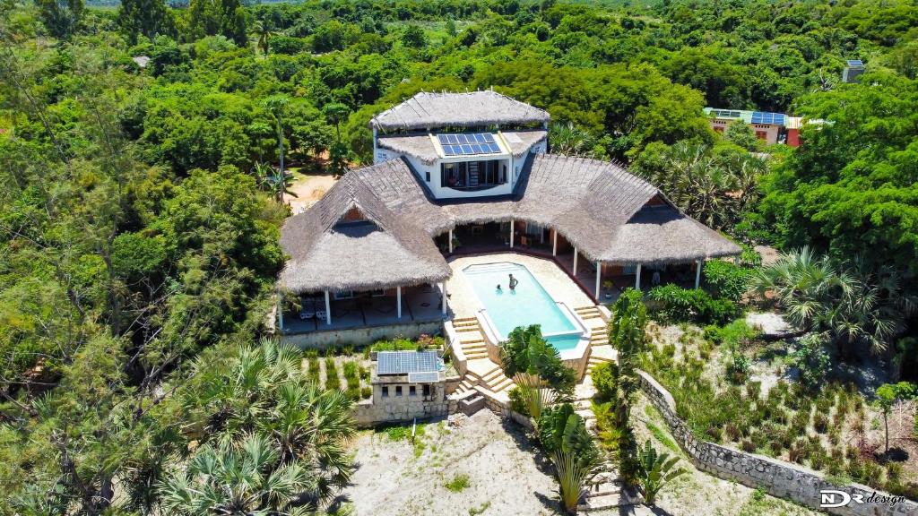 an aerial view of a house with a swimming pool at Antsanitia - Domaine du Mandravasarotra - DDM in Antsianitia