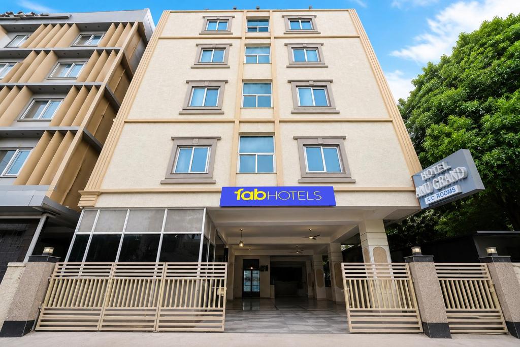 a building with ajob tots sign in front of it at FabHotel Anu Grand - Vijayawada in Vijayawāda