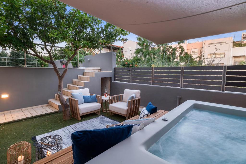 a hot tub on the roof of a house at Urban Living Homes, with Jaccuzi in Agios Onoufrios