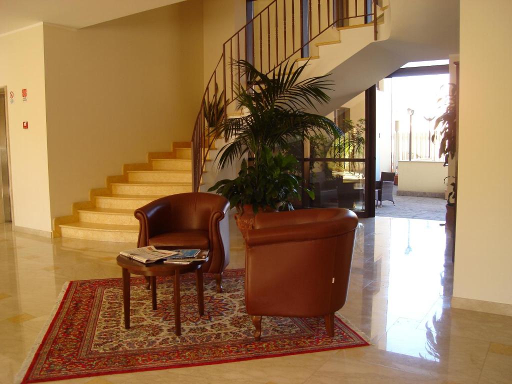 Posezení v ubytování Hotel Le Palme
