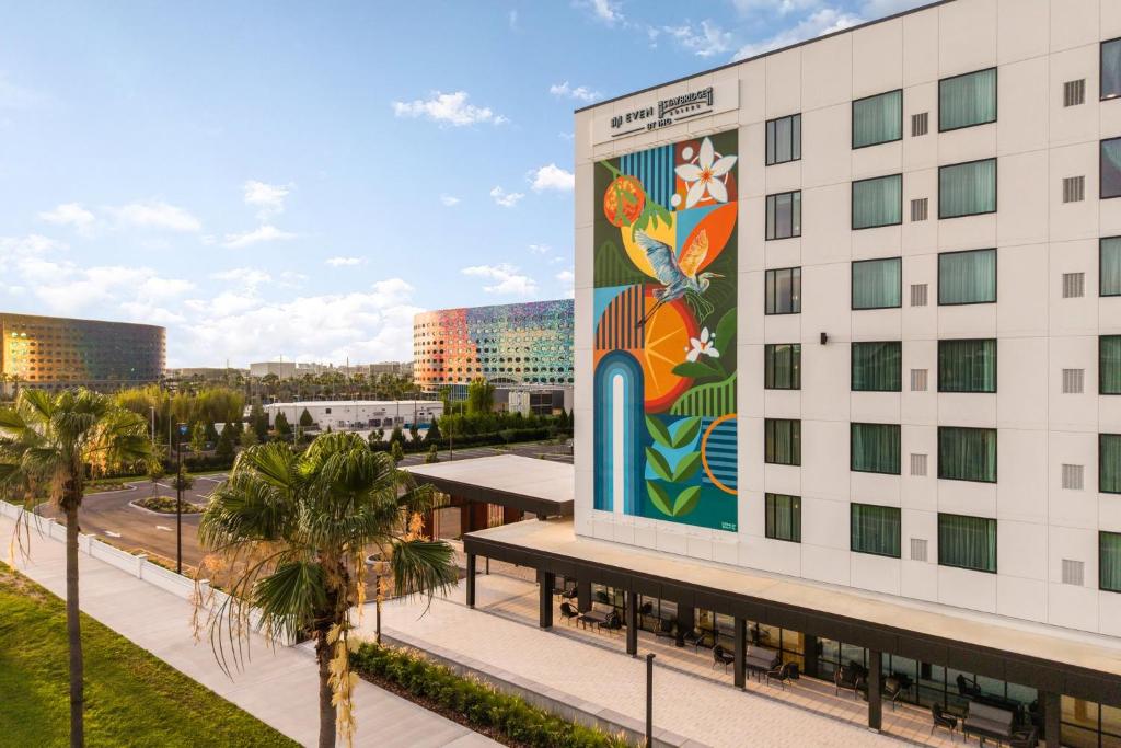 a mural on the side of a building at EVEN Hotel Orlando Universal Blvd by IHG in Orlando