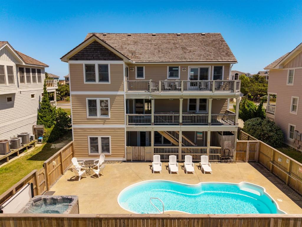 an aerial view of a house with a swimming pool at 6118 - Ferrari II in Nags Head