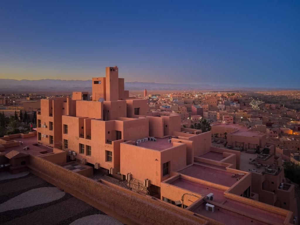 an aerial view of a city with buildings at Hotel Xaluca Dades in Boumalne Dades