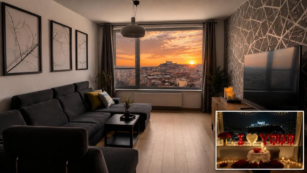 a living room with a couch and a large window at Sunset stay - Stunning views & Romantic Experience Option in Bratislava