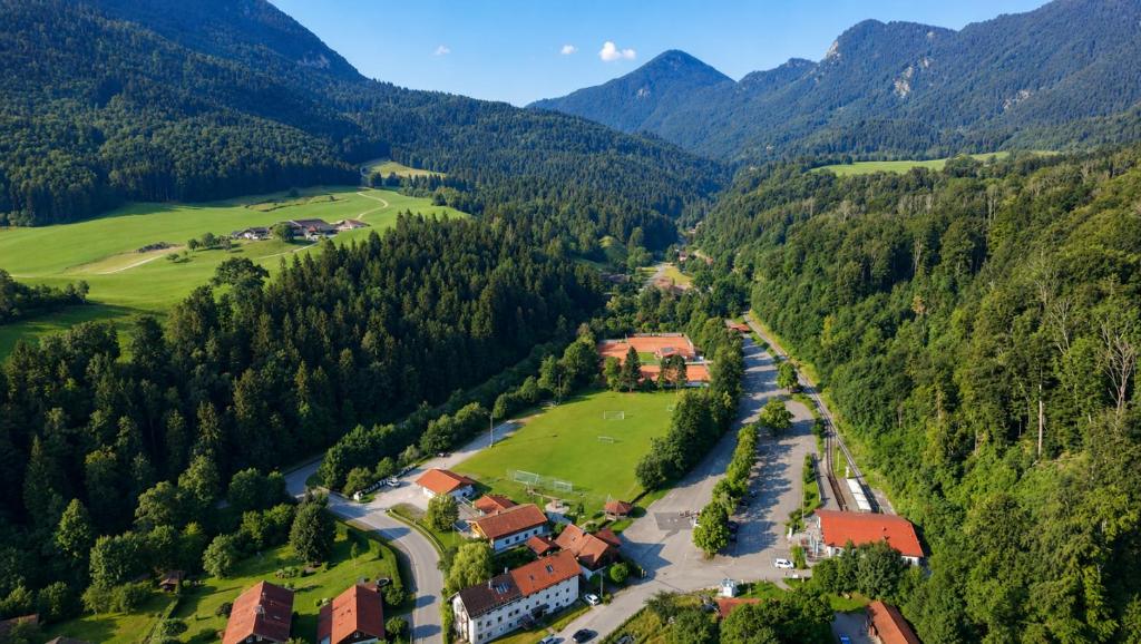 an aerial view of a village in the mountains at Mühle zu Waching in Brannenburg