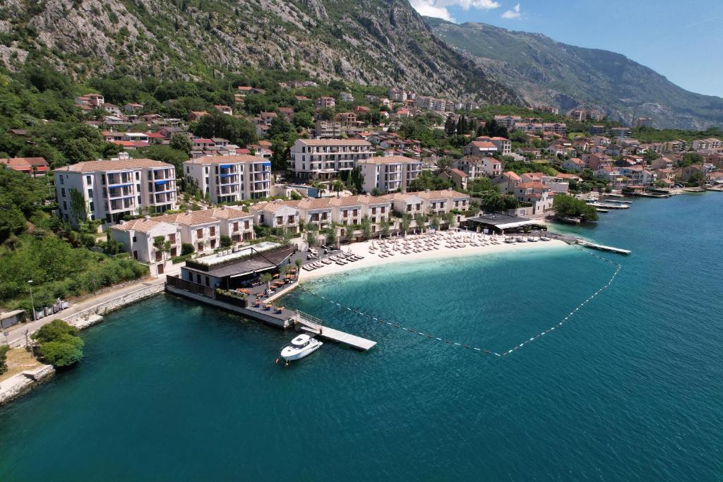 an aerial view of a resort on the water at Kotor Bay Villas by Huma in Dobrota