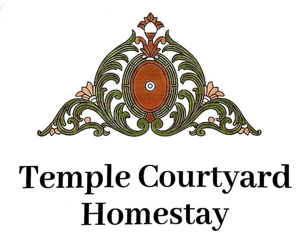 a logo for a templecourt homesteadhaunted homiversary at Temple Courtyard in Chengannūr