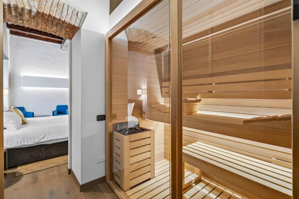 a sauna with a bed in a room at Relais & Spa Castello di Casiglio in Erba