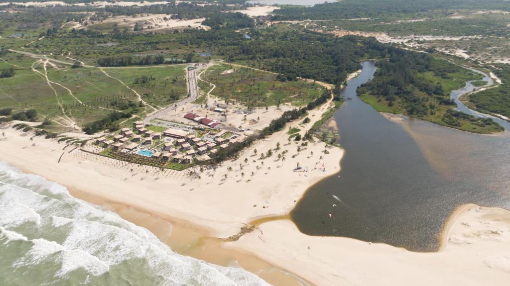 an aerial view of a beach next to the water at Vila Galé Collection Sunset Cumbuco in Cumbuco