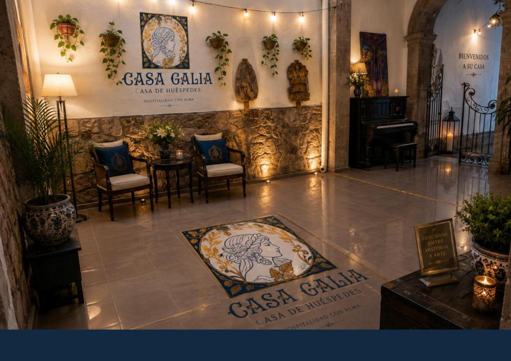a restaurant with a table and chairs in a room at Casa Galia in Morelia