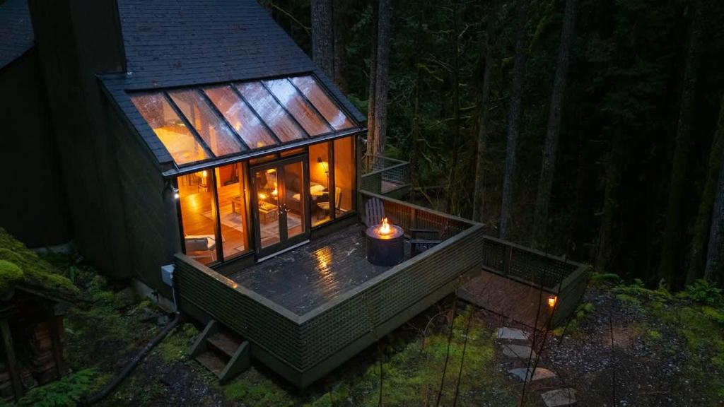 a small tree house with a candle on a deck at Skywood in Deming