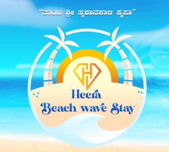 a beach wave stay sign on a beach with palm trees at Heera BEACH WAVE STAY in Gokarn