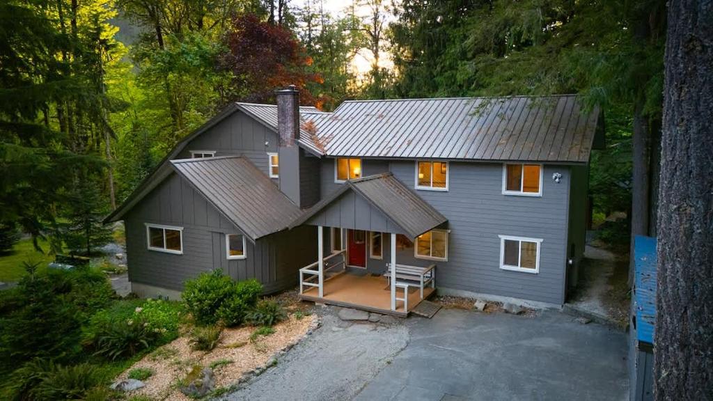 an aerial view of a house in the woods at Evergreen Lodge in Deming