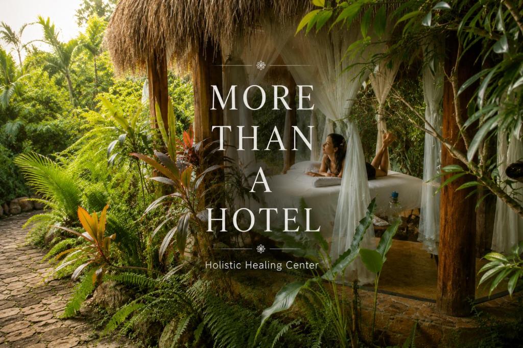 a book about a hotel with a bride in a bed at OMA CANCUN - Holistic Healing Center in Cancún