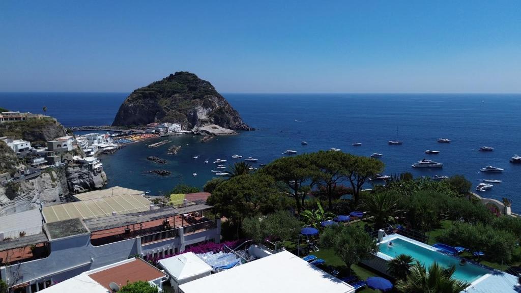 a view of a harbor with boats in the water at Hotel Casa Adolfo Ischia in Sant'Angelo D'Ischia
