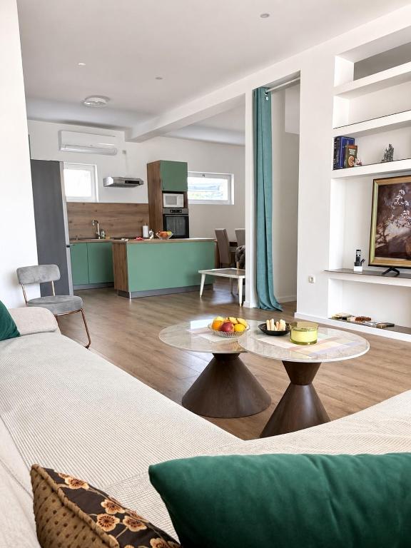 a living room with a couch and a table at Casa Mia in Višići