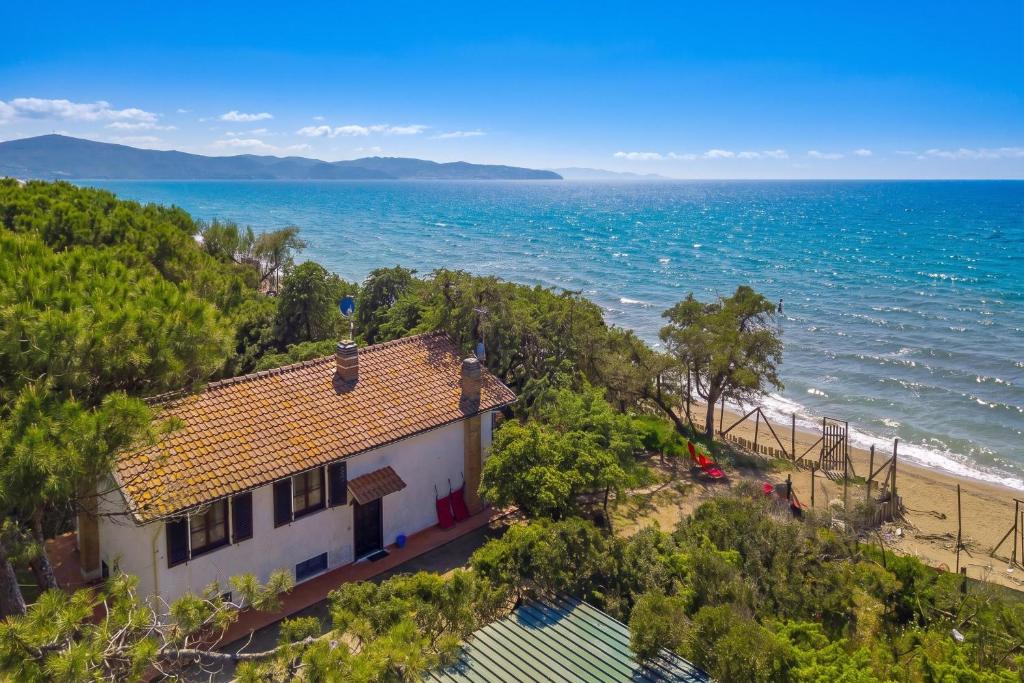 an aerial view of a house and the beach at Casa Giannellina - Happy Rentals in Orbetello