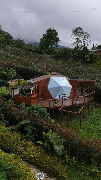 a tent in the middle of a field at Imperios Glamping in Silvania