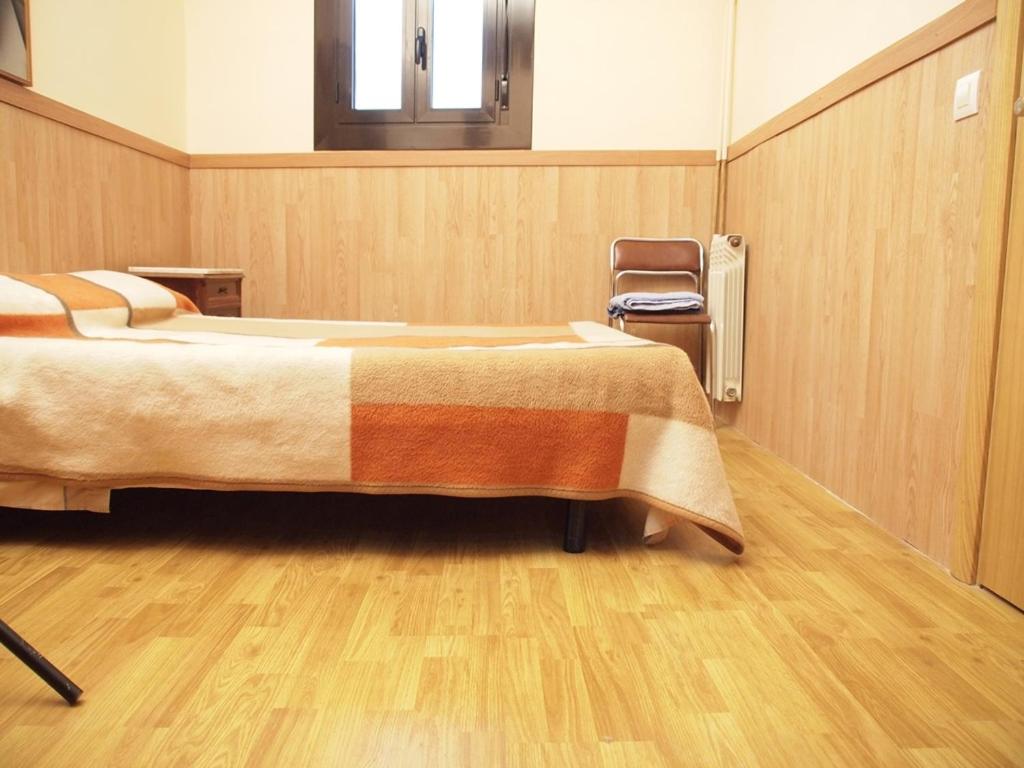 Postel nebo postele na pokoji v ubytování Pensión Villanueva