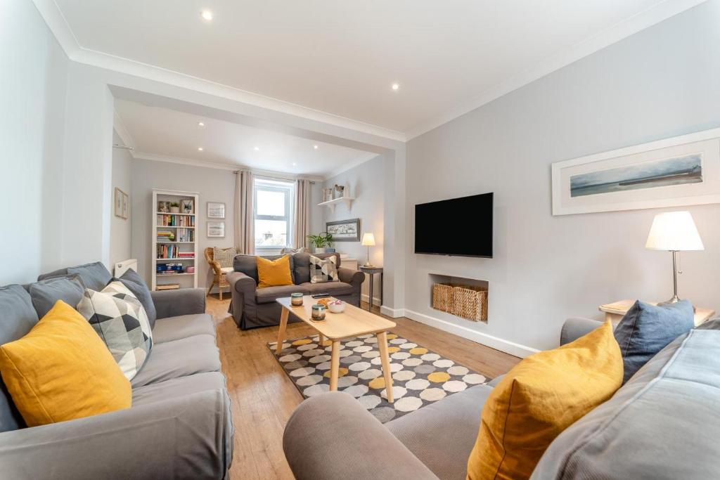 a living room with two couches and a tv at 4 Bed in Portpatrick oc-p43755 in Portpatrick