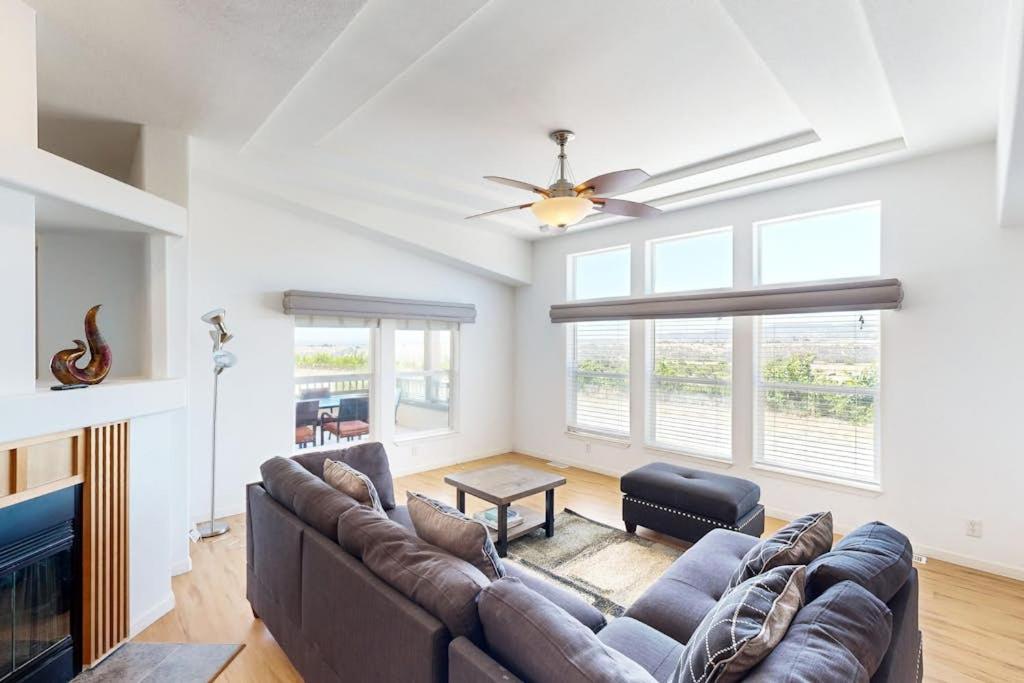 a living room with a couch and a ceiling fan at Nonpariel Escape in Paso Robles