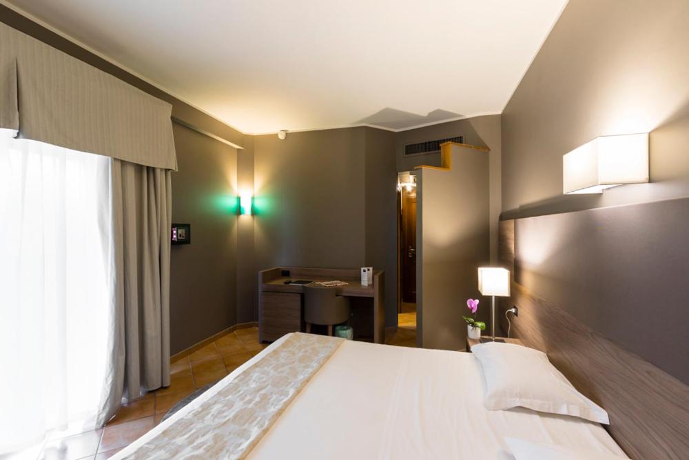 Postel nebo postele na pokoji v ubytování Hotel Sunflower