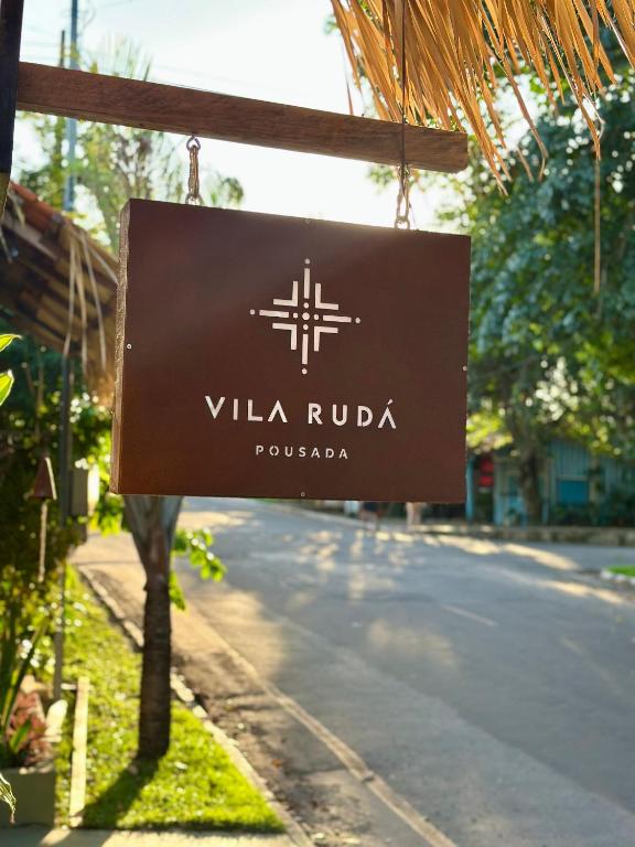 a sign that reads villa ruka pueblota hanging from a building at Vila Rudá - Alter do Chão in Alter do Chao
