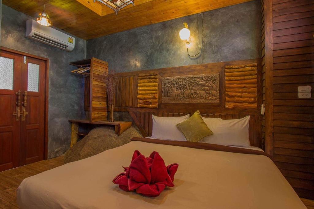 Postel nebo postele na pokoji v ubytování Sea Rock Resort