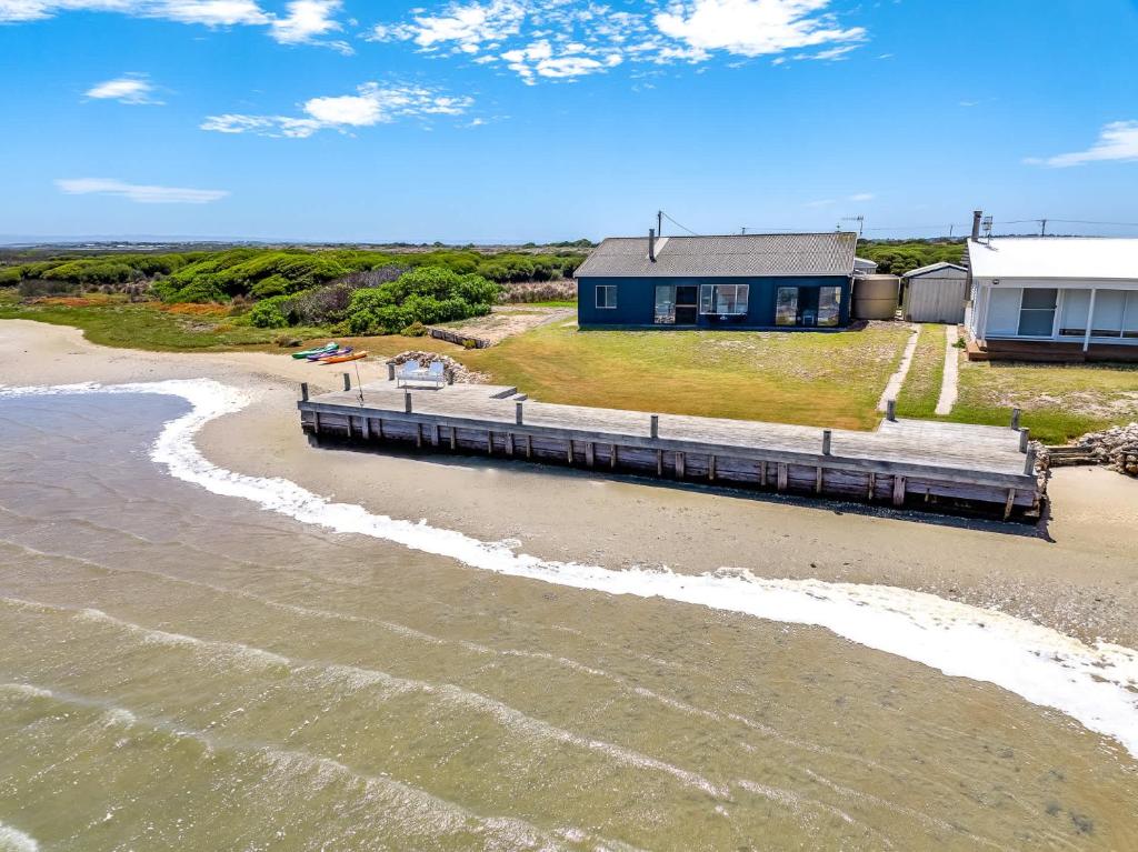 an aerial view of a house on the beach at Barnacles Shack - Mills Road in Hindmarsh Island