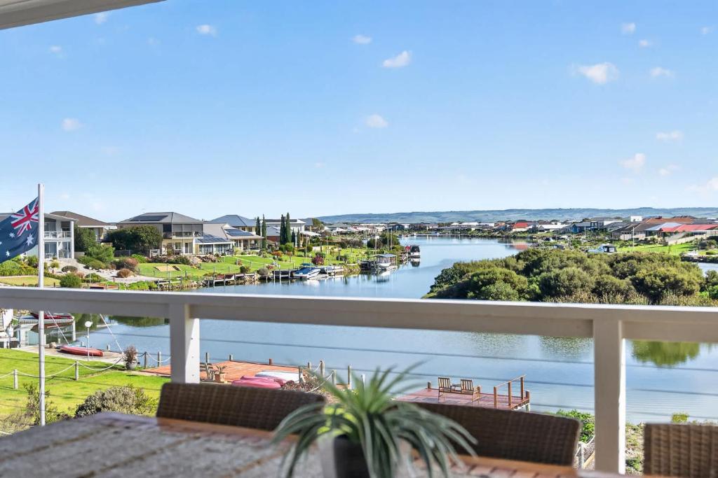 a view of a river from the balcony of a house at Marina Breeze - Excelsior Pde in Hindmarsh Island