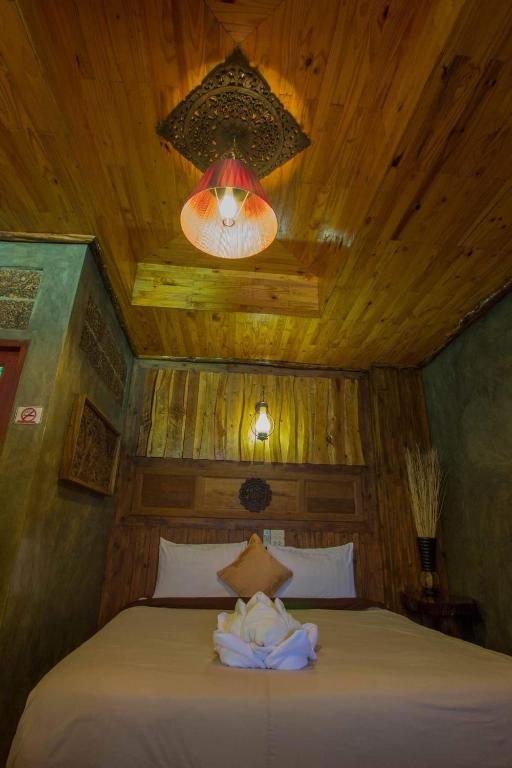 Postel nebo postele na pokoji v ubytování Sea Rock Resort