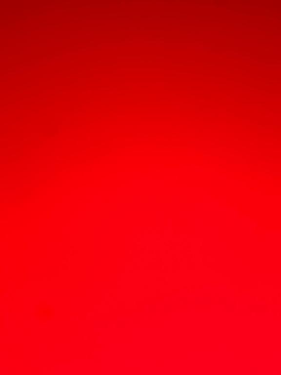 a bright red background with at Dream in Amman